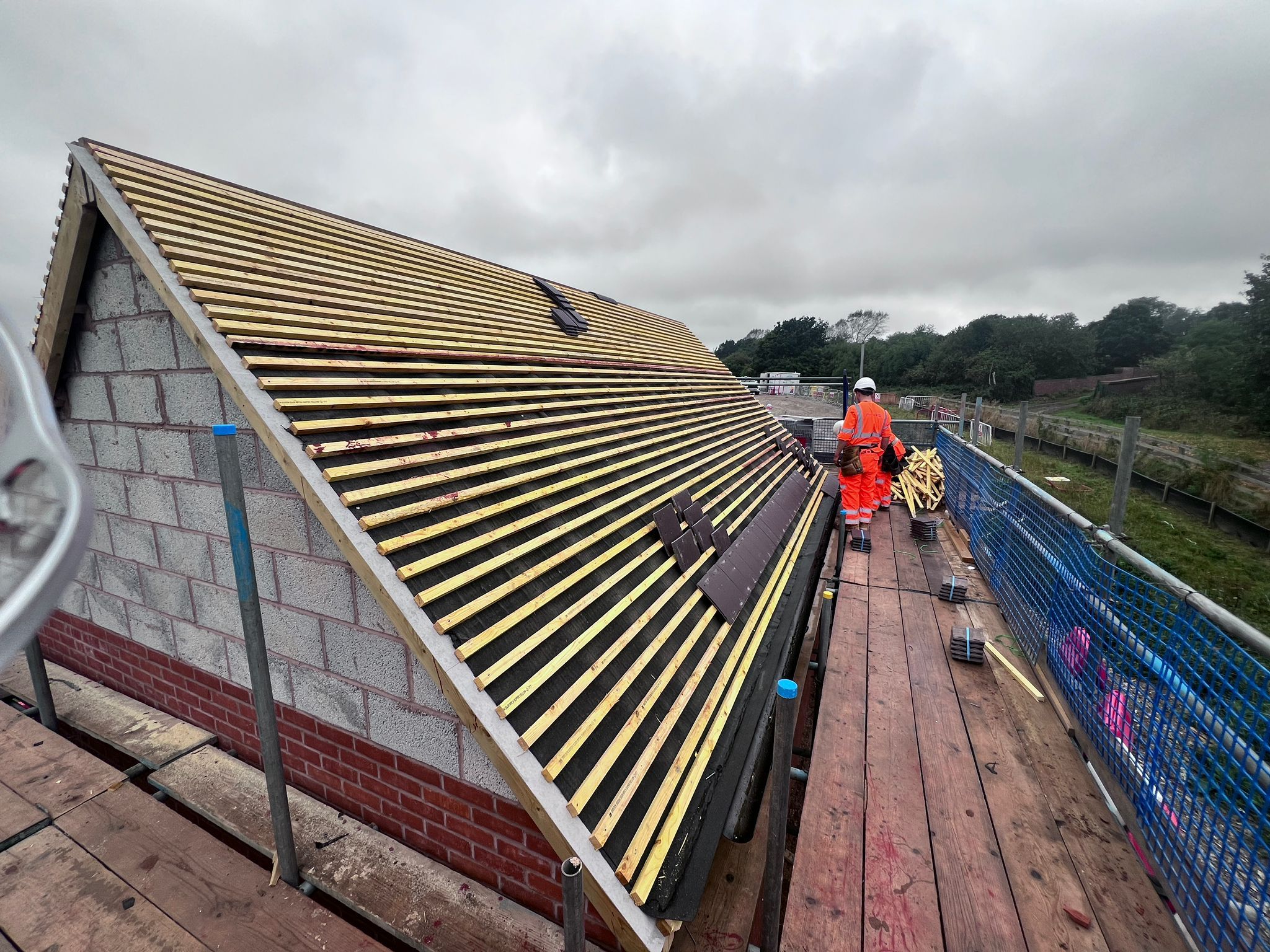 Ecological bat house construction on a construction site, ensuring wildlife protection and environmental compliance.