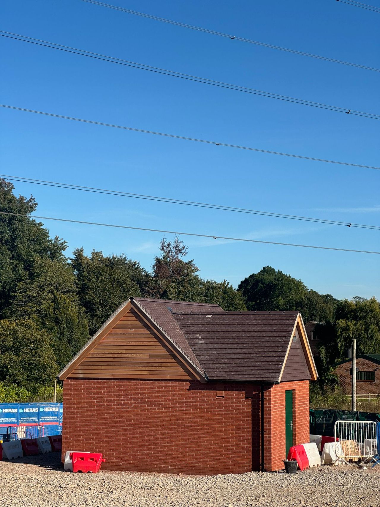 Completed ecological bat house on a construction site, supporting biodiversity and environmental sustainability.